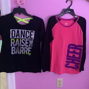 Two long sleeve shirt ones black ones pink